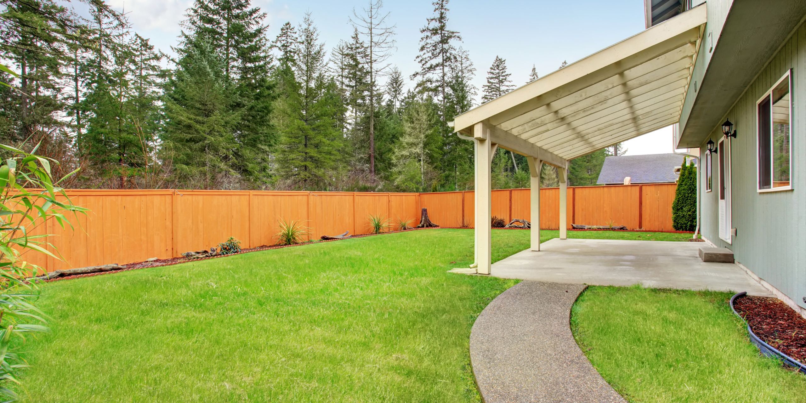 Protect Your Property: The Benefits of Upgrading Your Patio Cover and Garage Doors